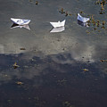 three paper boats